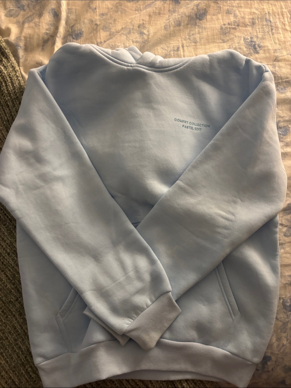 Pastel Blue Crewneck Sweatshirt with Subtle Chest Text